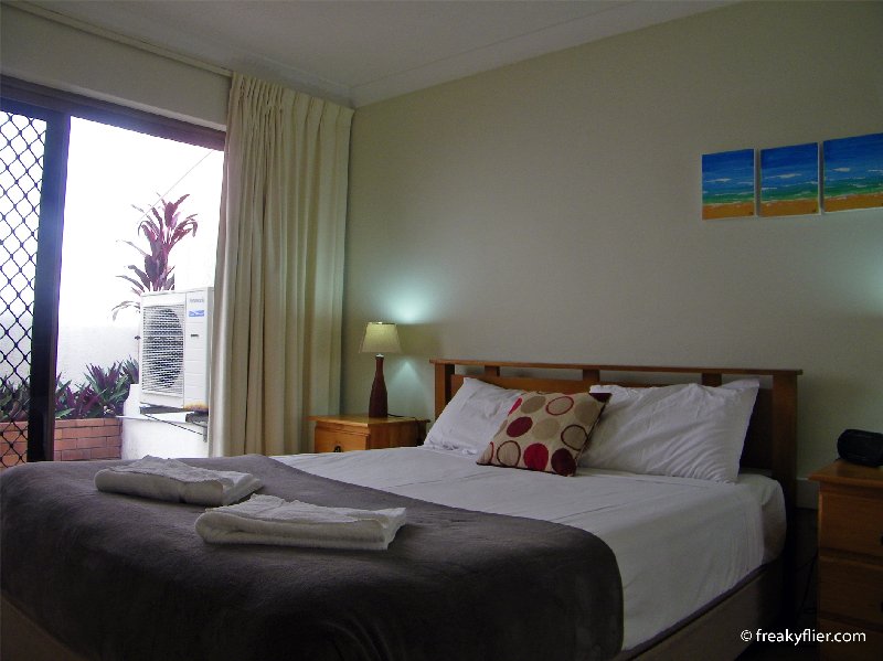 The bedroom at St Tropez Apartments