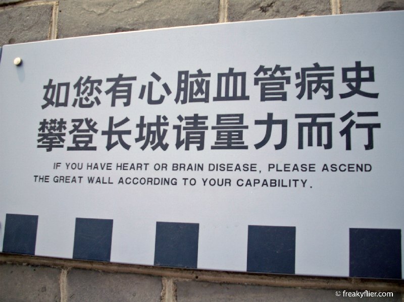 Warning signs are erected before ascending the steps up the mountain