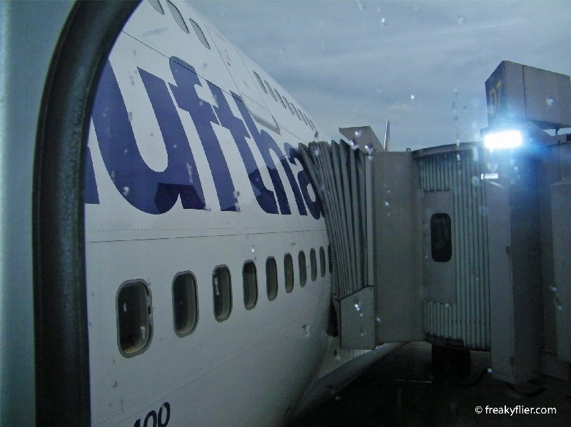 First and Business Class board through the first aerobridge while Economy board through the second
