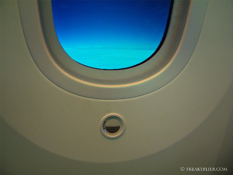 Touch button to lighten or darken the window tinting