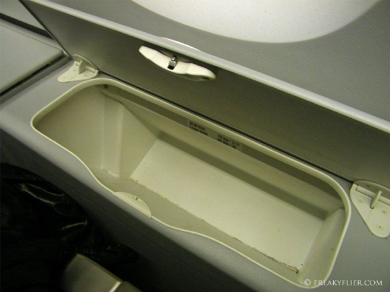 Compartment storage for the window seat in Economy Class
