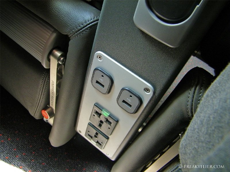 USB port and power supply to every Business Class seat