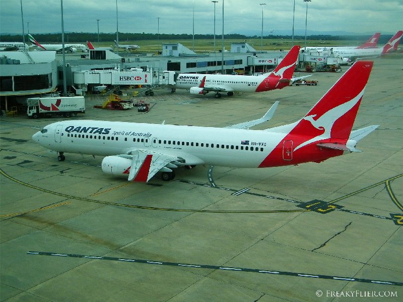 My arriving aircraft and another 737 in the foreground as seen from The Qantas Club, Melbourne