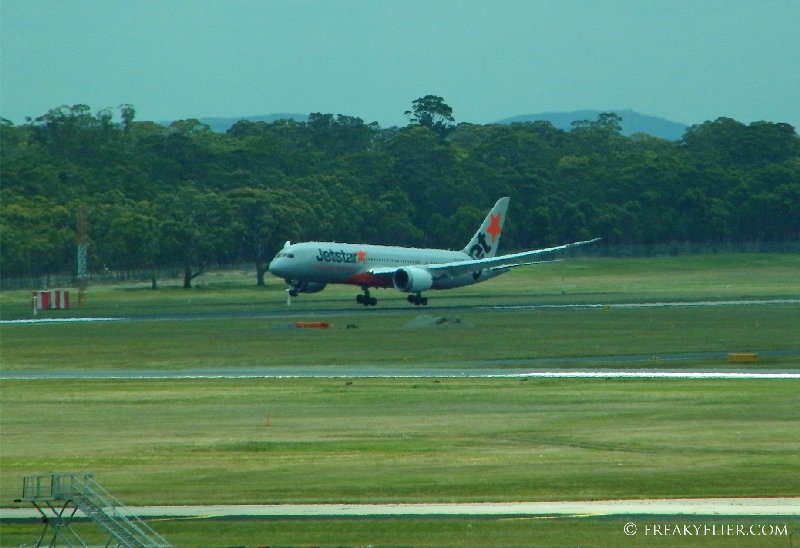 Jetstar's Boeing 787 Dreamliner lands at Melbourne Airport as viewed from the Qantas Club
