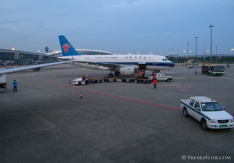 Disembarking down the forward stairs of the Airbus a321 next to an Airbus a319 