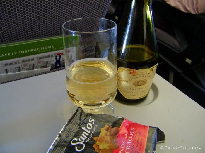 Champagne on board Qantas Economy to Melbourne