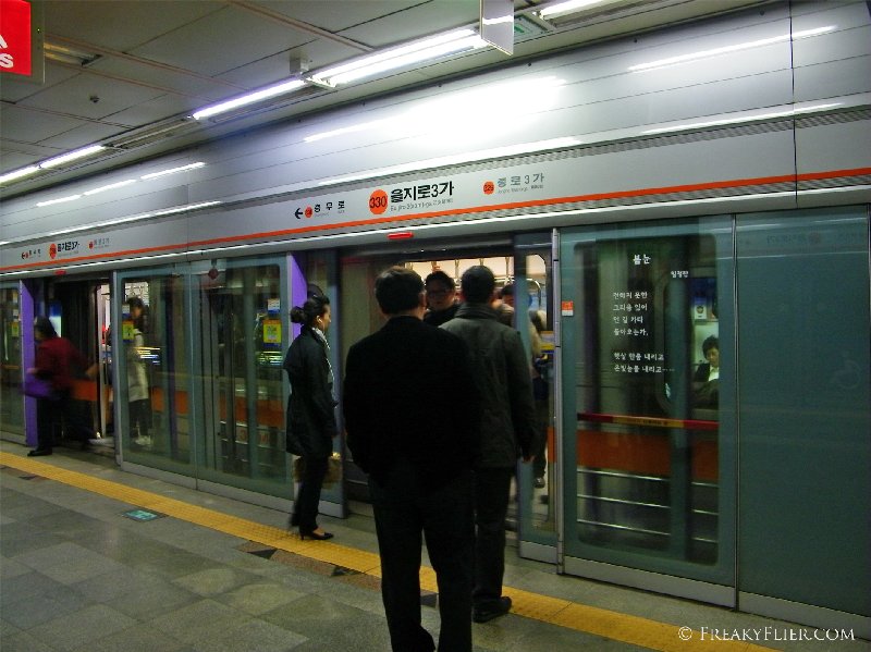 Orderly boarding at a Seoul subway station