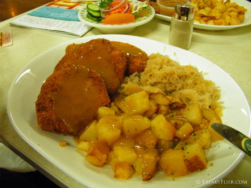 Kasseler - crumbed slies of rost pork loin with potato and sauerkraut. Large - $19