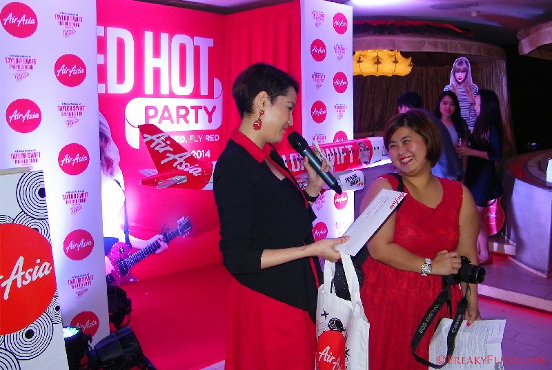Yasmin Hani hands out prizes to a few lucky guests