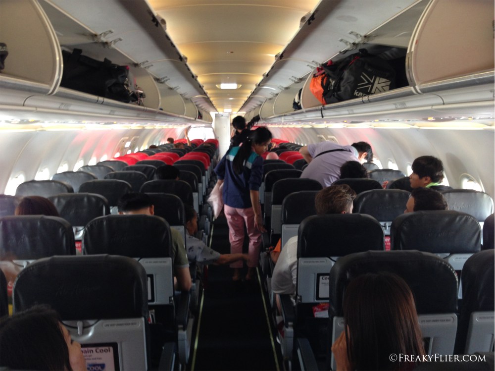 Settling in for the flight on board Air Asia to Mandalay