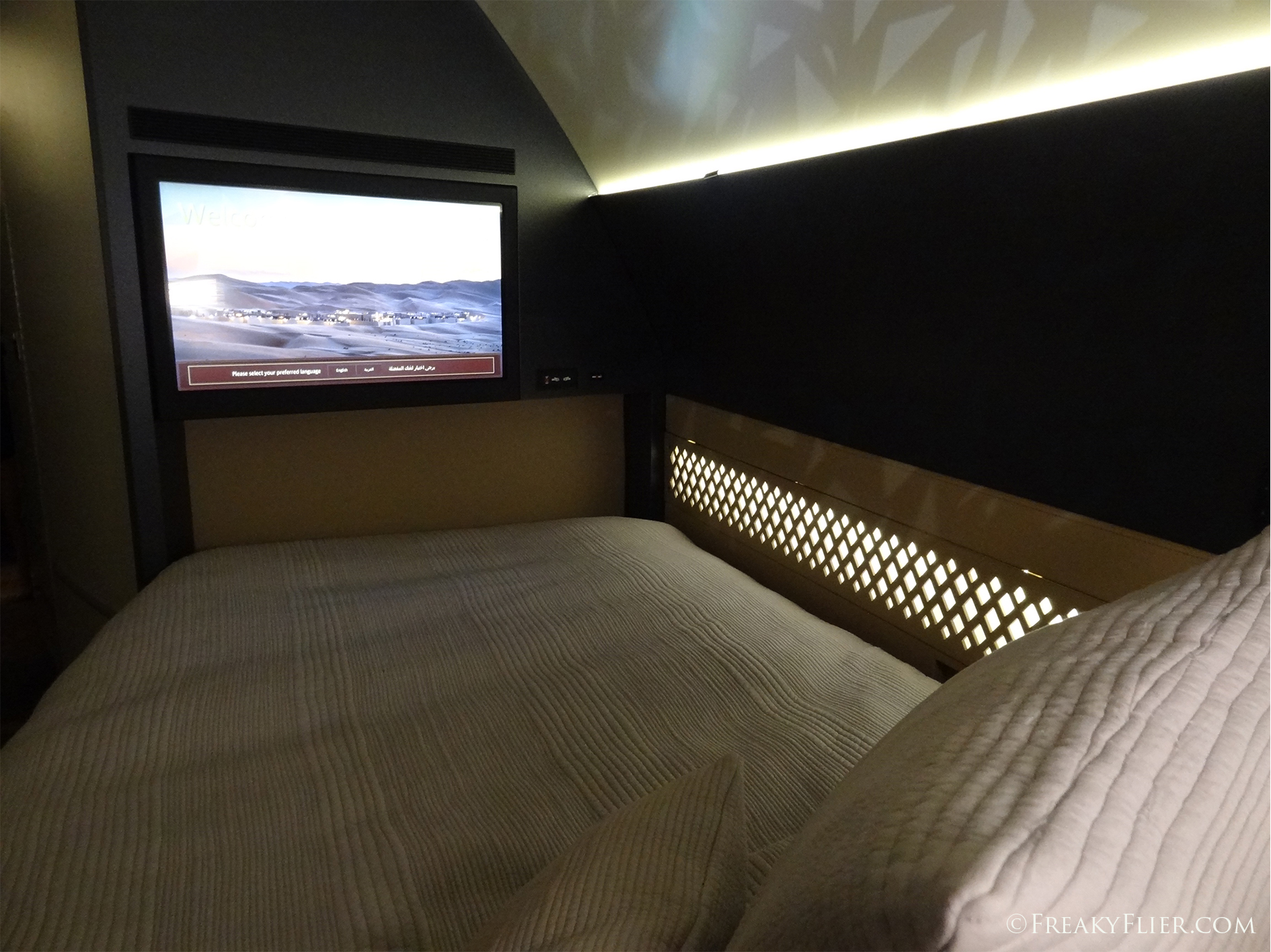 32 inch flat screen TV from the bed in The Residence