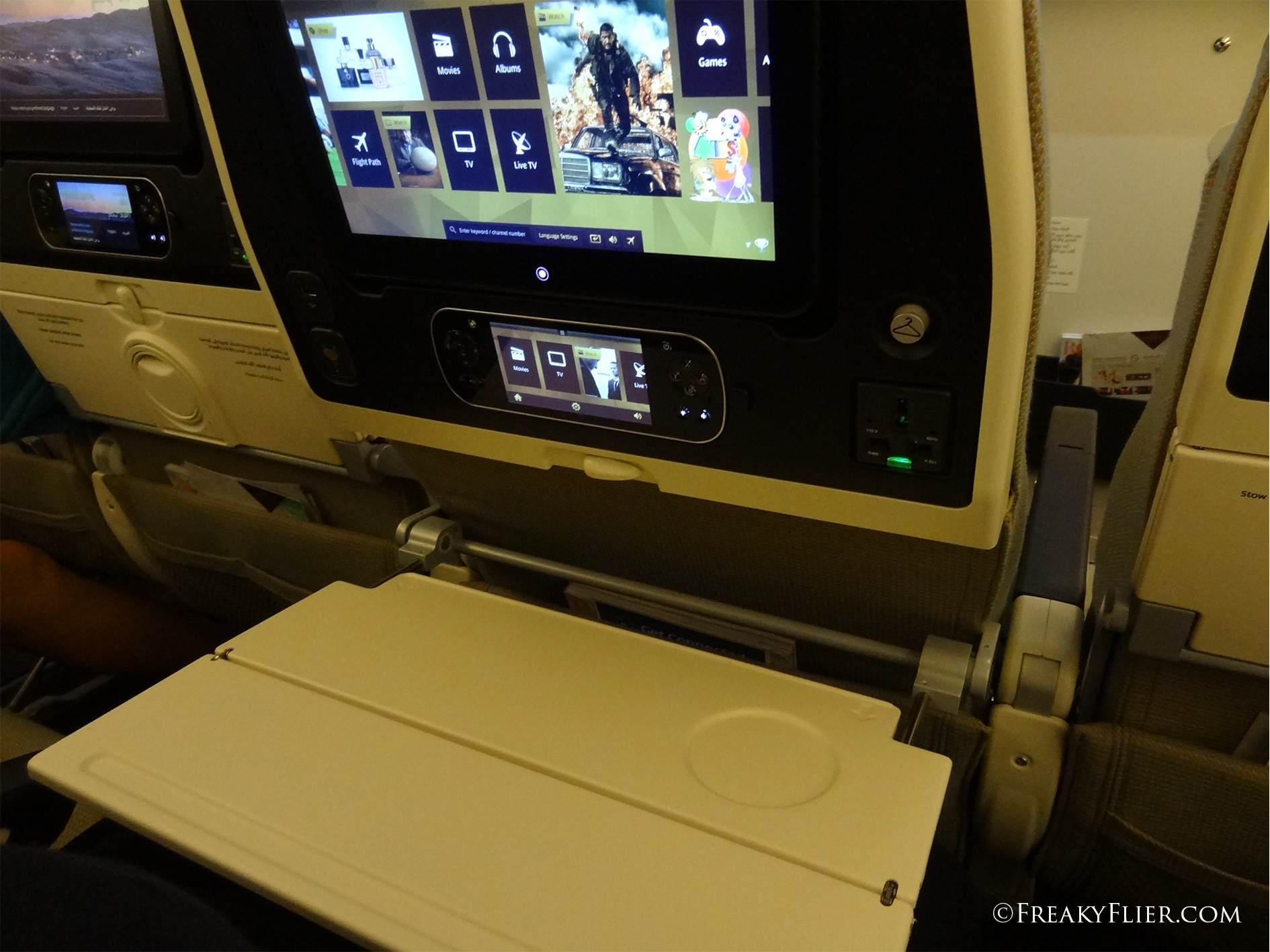 Economy Class AVOD screen and remote screen plus bi-folding tray table