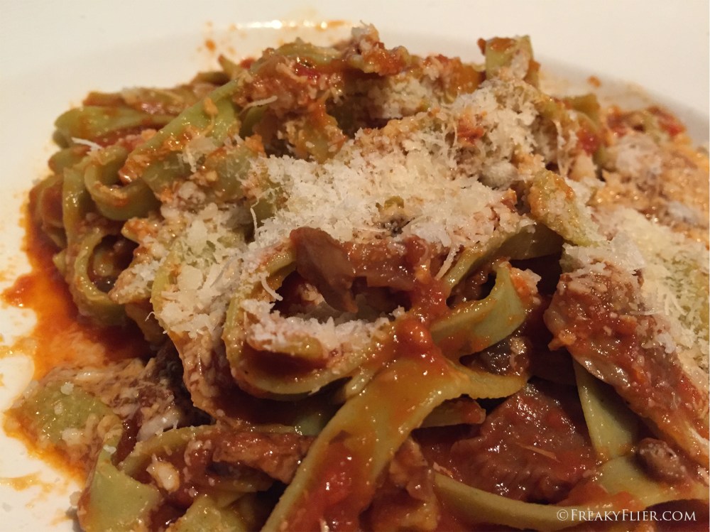 Spinach Fettuccini with Mushrooms in a garlic-tomato sauce