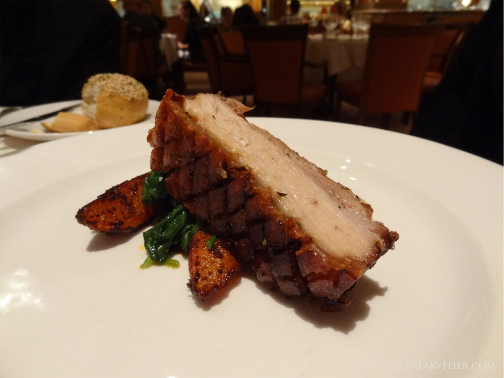 Twice Cooked Pork Belly with Crispy Crackle, roasted carrots and English Spinach