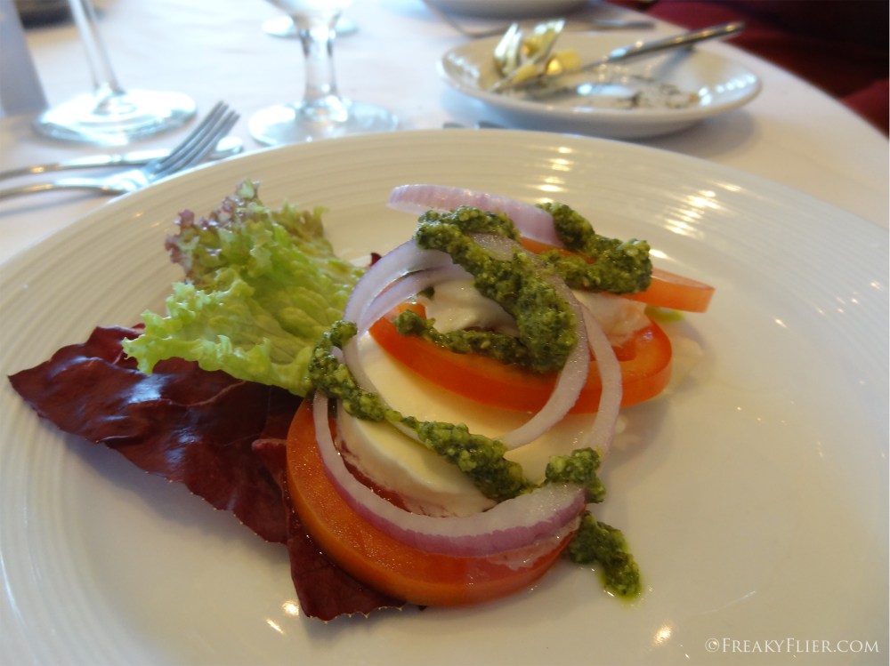 Insalata Caprese, Tomato, fresh Mozarella and aromatic basil pesto drizzle